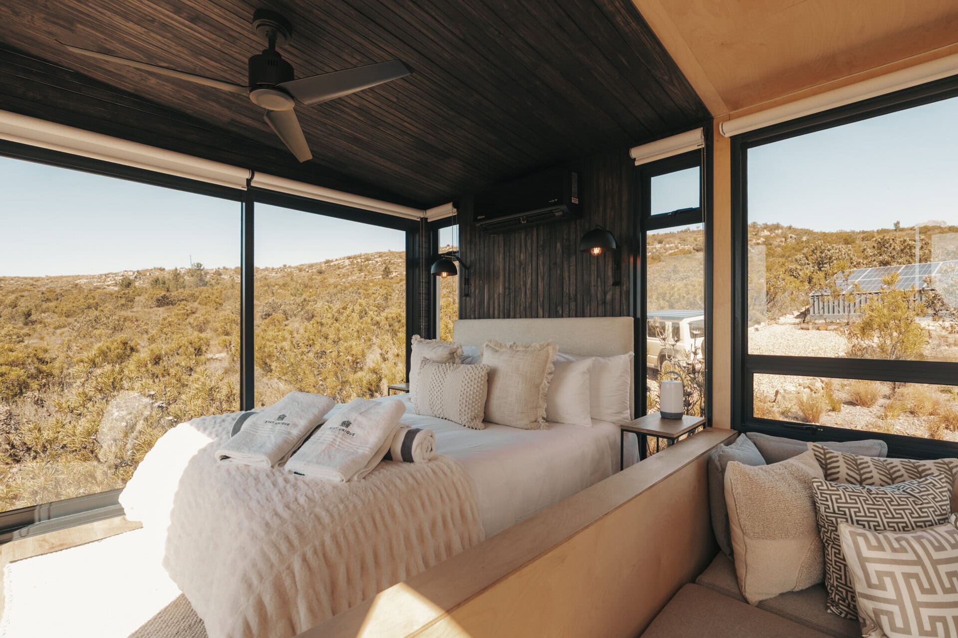 Glass forest cabin interior